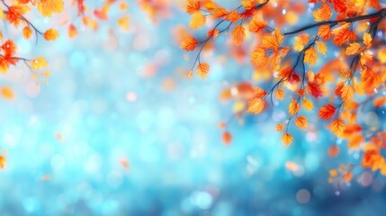 Fototapeta premium Autumn leaves against a soft blue background