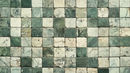 Close-up view of a patterned mosaic tile floor.