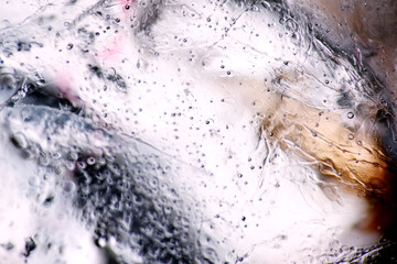 Extreme macro of air bubbles on ice block