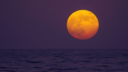 Giant Orange Moon Over Dark Ocean Night