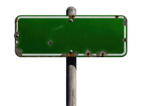 Weathered green blank street sign on a wooden post.