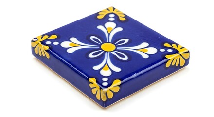 A single, vibrant Talavera-style ceramic tile, featuring a classic hand-painted floral or star-like motif in bright yellow and crisp white against a rich, glossy cobalt blue background.