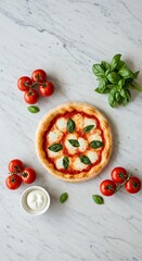 Minimalist flat lay of a Margherita pizza surrounded by fresh ingredients on a marble countertop