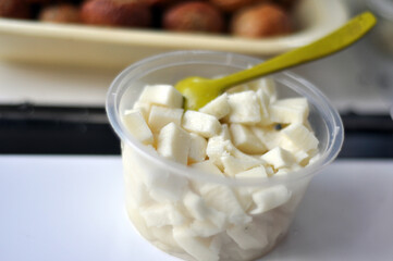 pieces of cheese in a bowl