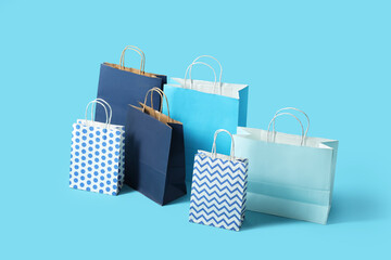 Shopping bags on blue background