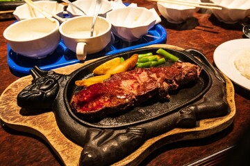 Sizzling Steak Dinner on a Hot Plate
