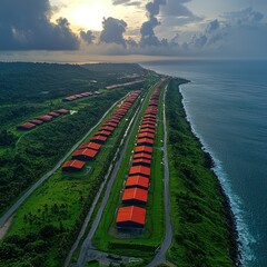 Aerial View of Coastal Buildings with Red Roofs and Ocean Scenery