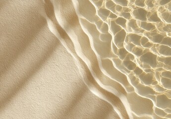 Sun-dappled sand meets shimmering, shallow water, creating a serene, minimalist beach scene