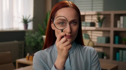 Serious business woman face girl Caucasian businesswoman look through magnifier vision test investigator scientist spy looking with magnifying glass big zoomed eye searching analyzing investigating - Powered by Adobe