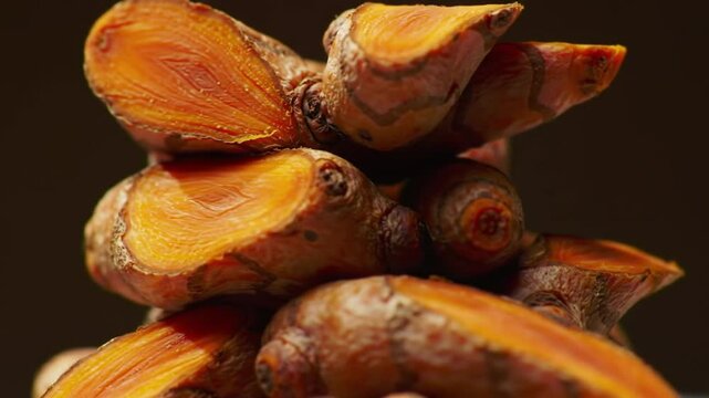 Freshly Cut Turmeric Roots Displayed In An Attractive And Natural Pattern