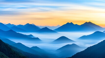 Obraz premium Stunning view of mountains at sunrise, enveloped in a misty fog. A serene landscape capturing the beauty of nature's tranquility.
