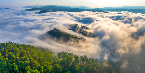 Aerial view of the Cau Dat suburbs near Da Lat city at morning with misty sky in Vietnam highlands