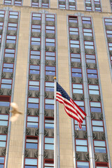 american flag in the city