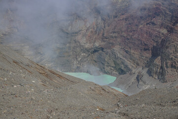 March 25 2025 Breathtaking Volcanic Crater with Steaming Lake and Rocky, Japan