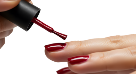 Close Up Of Woman Applying Red Nail Polish On Fingernails Isolated