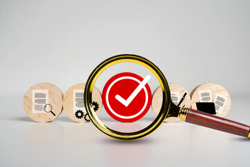 Magnifying Glass Focuses on Red Check Mark with Document Icons, Quality Control and Verification Concept