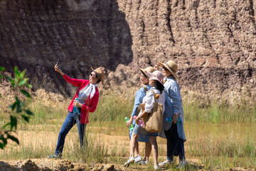 Asian senior elderly healthy group of females selfie taking picure together at natural park, pensioner friends recreation traveling freedom holiday vacation after retirement, aging society lifestyle - obrazy, fototapety, plakaty