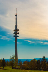Alpine spring view with a TV tower at the famous Hohenpeissenberg mountain, Weilheim-Schongau, Bavaria, Germany