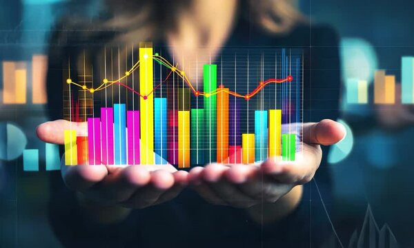 Hands holding colorful bar graphs