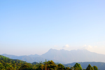 Beautiful landscape of valley Doi Luang Chiangdao mountain with cloud and blue sky in Chiangmai Province of Thailand. Travel destination
