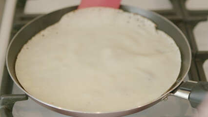 Discover the Secrets to Cooking Delectable and Light Fluffy Crepes Right in Your Pan at Home