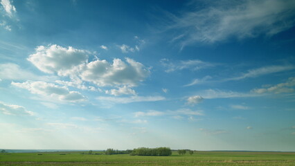 A Serene Sky Over the Expansive and Lush Green Fields Making Up the Beautiful Countryside
