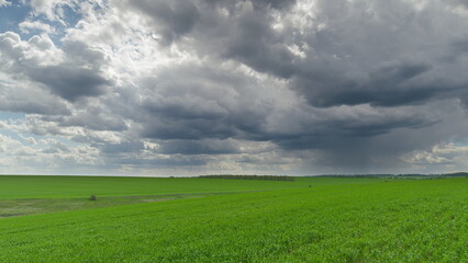 Dramatic Skies Above Lush Green Fields A Truly Stunning and Beautiful Natures Canvas Time lapse.
