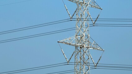 A detailed view of a power tower, symbolizing the intricate network that powers industries and...
