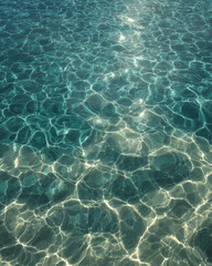 Obraz premium Crystal Clear Water Surface A Close-Up of Sparkling, Aqua Marine Texture