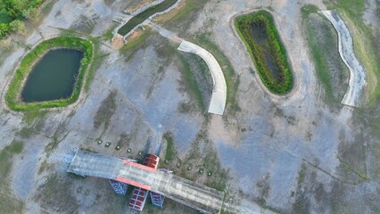 From above, the complex design of the 4x4 obstacle course is revealed, with strategically placed...
