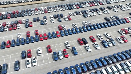The vast, neatly arranged rows of cars exemplify the precision needed in managing large fleets, whether for dealership purposes or rental services, with an emphasis on order and accessibility.
