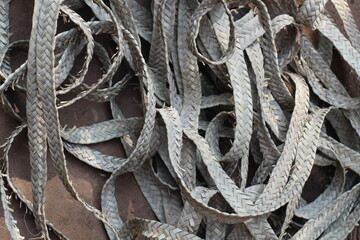 Rural Artisan Creating Palm Leaf Rope for a Wooden Charpai