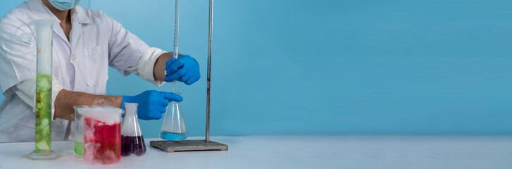 Banner Caucasian Scientist test experiment research science laboratory. Expert man microscope medical analyze. Banner Biochemistry scientist white lab coat hand holding test tube with copy space