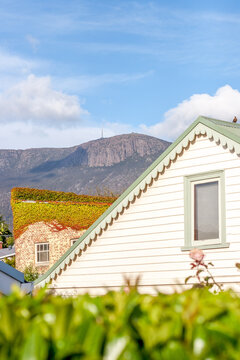 Looking through historic houses in South Hobart to Mount Wellington and the Organ Pipes