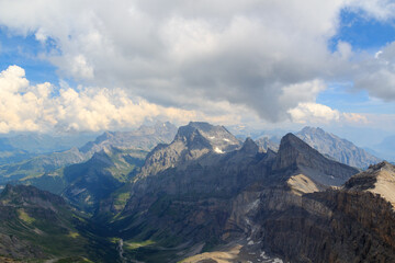 Mountain panorama with summits Grand Muveran, Petit Muveran and Dent Favre seen from summit Dent de Morcles in Swiss Alps, Switzerland