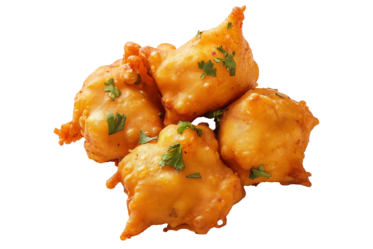 Crispy golden vegetable Indian fritters Pakoras with herbs, isolated on white transparent background, concept of traditional snack