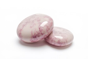 Fototapeta premium Two Smooth, Decorative, Light Purple-Pink Stones on White Background
