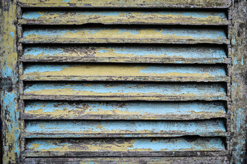 Close up view of old window. Wooden, rusty, rustic, vintage, classic, blue. Side view.