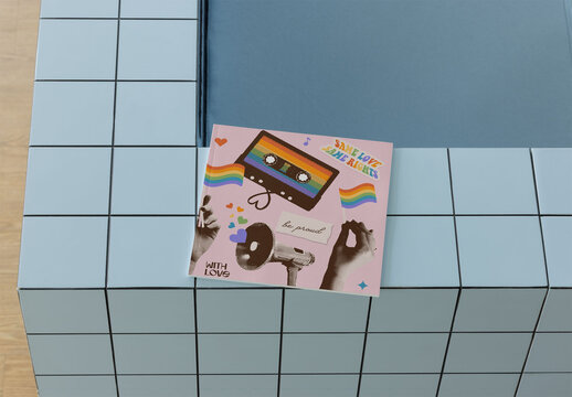 Blank notebook cover displayed on a tiled surface. 216x216 mm // 8.5x8.5 in