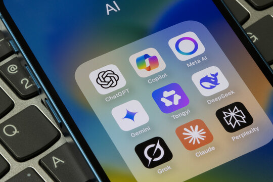 Portland, OR, USA - May 19, 2025: Assorted AI apps, including ChatGPT, Copilot, Meta AI, Gemini, Tongyi Qianwen (Qwen), DeepSeek, Grok, Claude, and Perplexity, are seen on the screen of an iPhone.