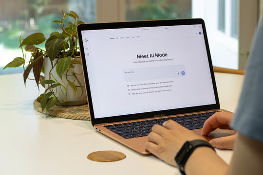 Portland, OR, USA - May 26, 2025: A laptop user uses AI Mode in Google Search. AI Mode helps you search more effortlessly by combining the capabilities of Gemini 2.0 with Google's information system.
