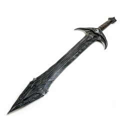 A decorative, fantasy-themed sword with intricate designs and a dark finish. on white background
