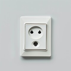 A white electrical outlet on a light gray wall, designed for plugging in devices. on white background