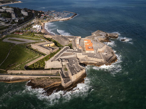 Beautiful aerial view to old historic fortress by ocean in Carcavelos