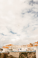 Obraz premium Walking cobbled streets in your European vacation Ericeira Portu