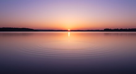 Naklejka premium Peaceful Sunset over Lake with Water Ripples - Serene Nature Landscape Photography.