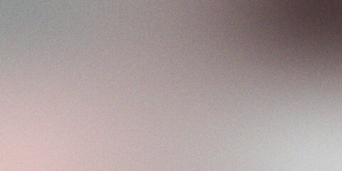 Abstract background of gradient colors with noise and textured grain appearing on surface.