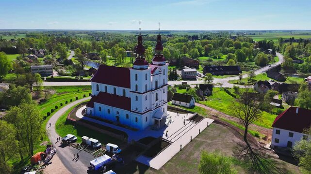 Majestic Architecture Of The Rural Church of the Assumption of the Blessed Virgin Mary, Skaistkalne In Latvia. Aerial Drone Shot