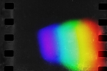 Old film light leaks texture with scratches, noise, iridescent stripes. Rainbow lens flare effect,...