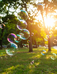 Brightly colored bubbles drift through the air in a sunlit park, evoking a sense of wonder and playfulness.